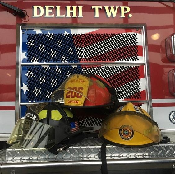 firefighter's helmets and front of fire engine